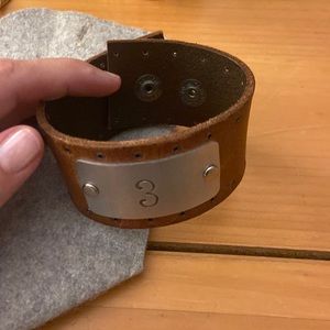 Leather cuff with number 3